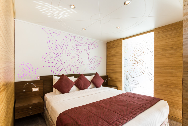 Cruise & Maritime Voyages Magellan Accommodation Deluxe Suite Bedroom.jpg