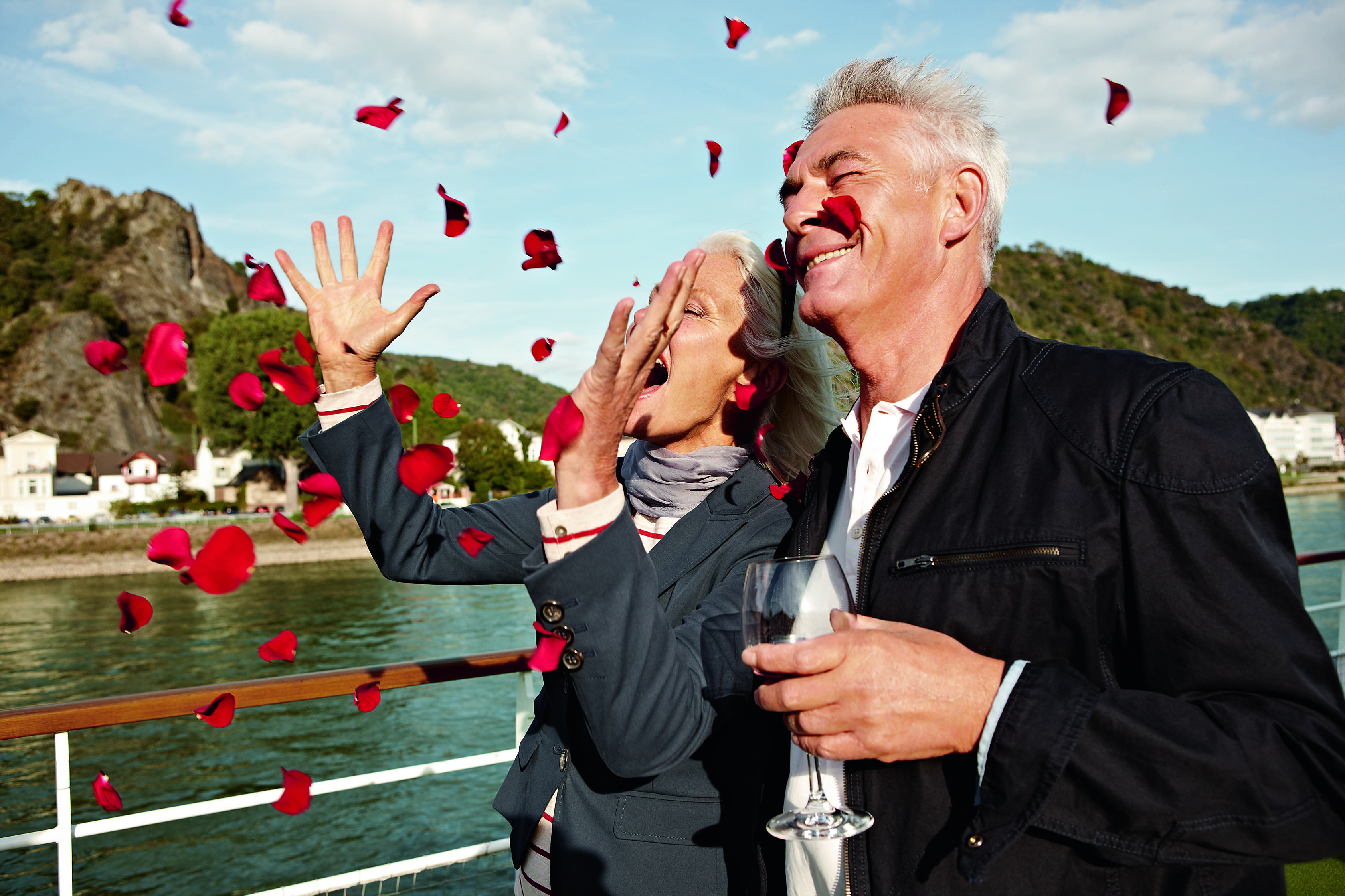 A-ROSA AQUA A-ROSA VIVA A-ROSA BRAVA Exterior Couple on Deck Drink Celebration.jpg
