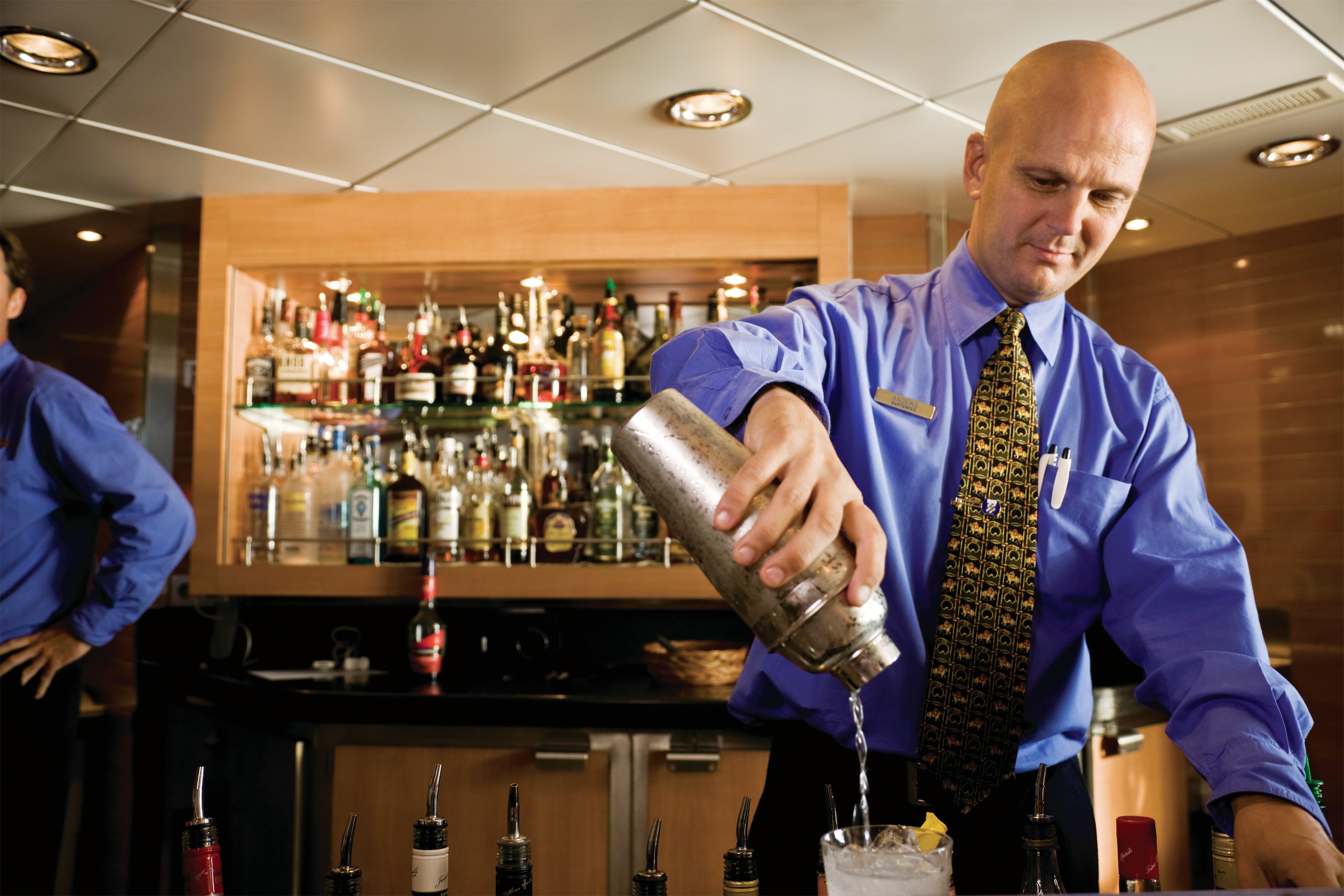 Lindblad Expeditions National Geographic Explorer Interior Bar Bartender.jpg