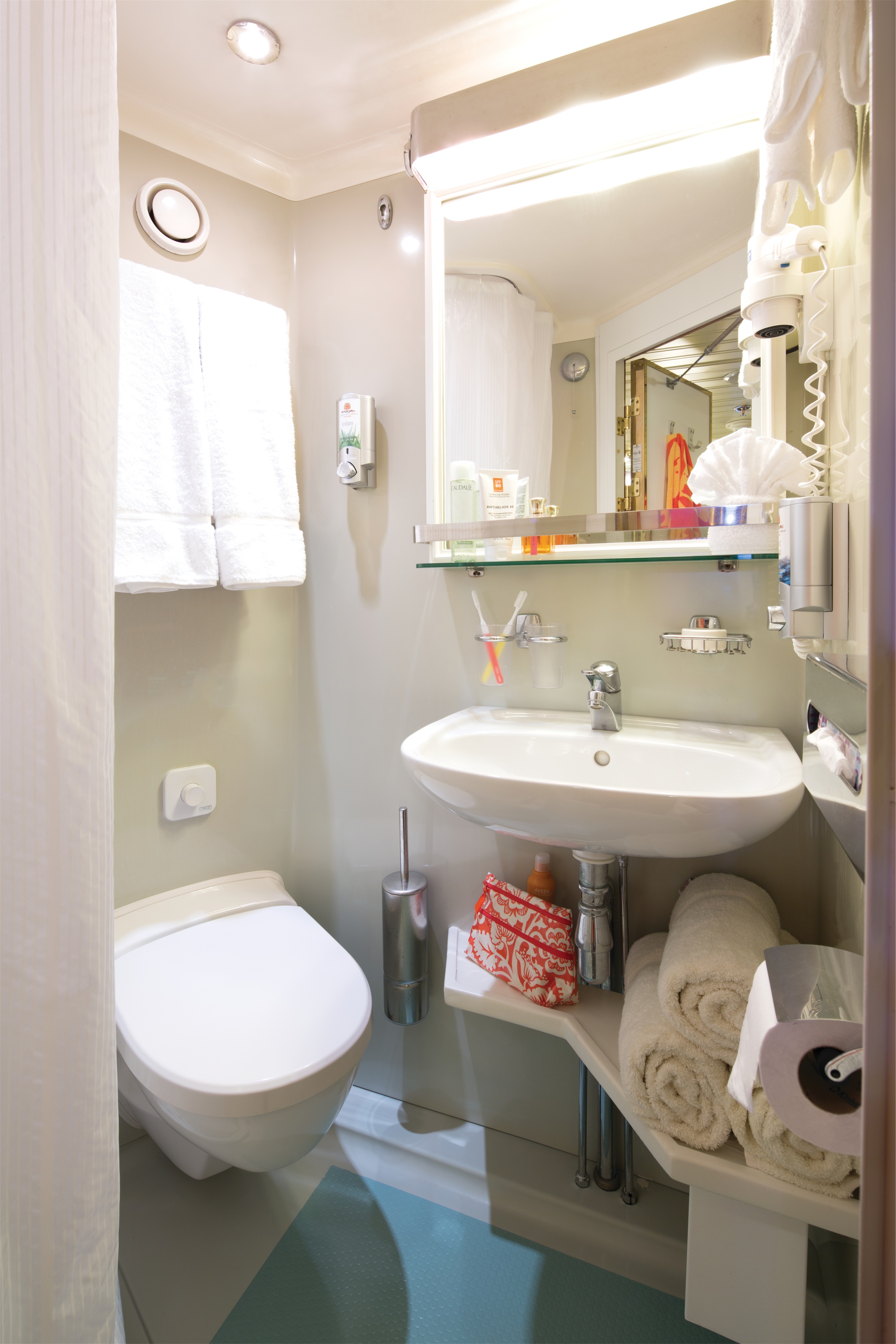 Lindblad Expeditions National Geographic Islander Accommodation Standard Bathroom.jpg