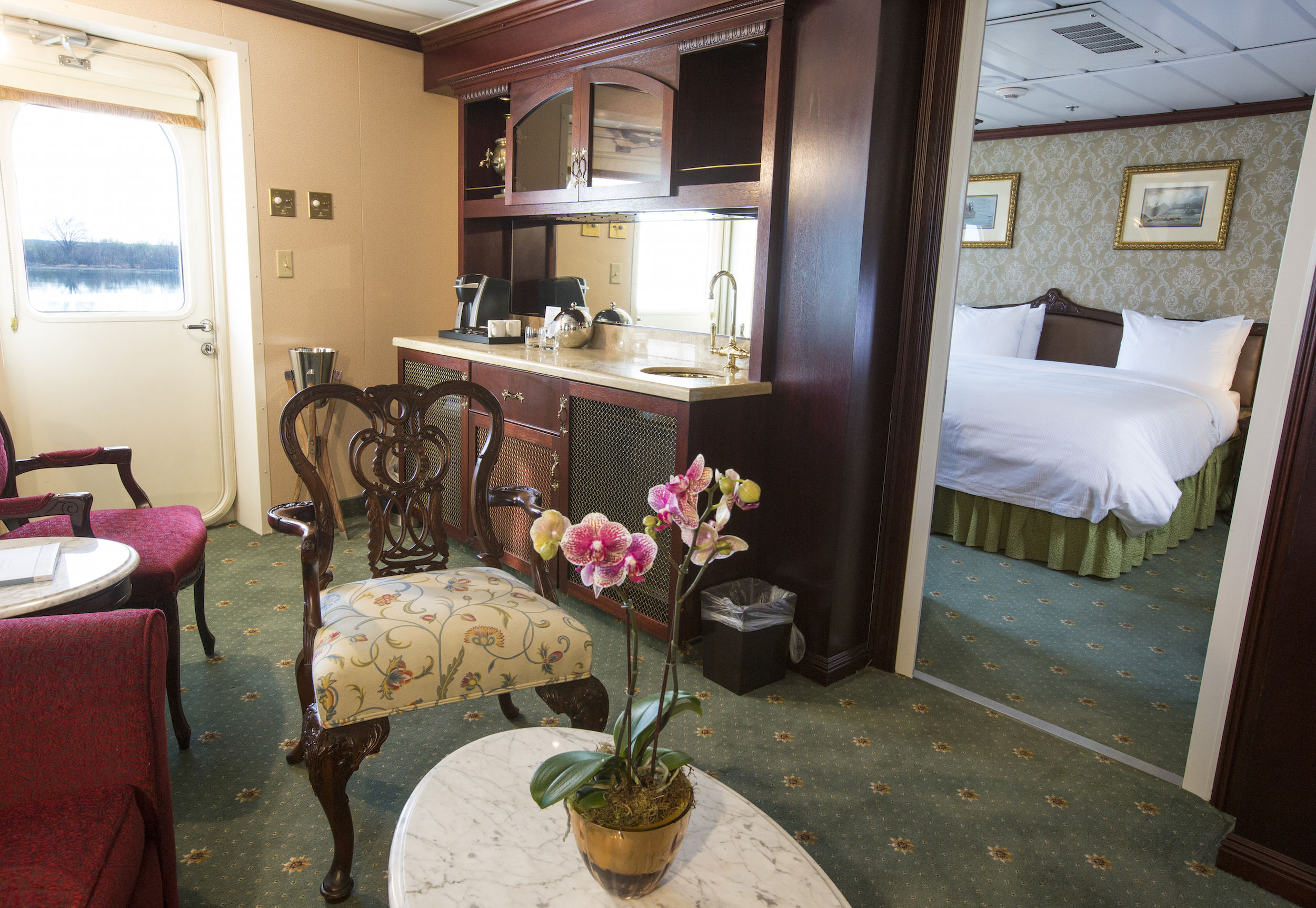 American Queen Steamboat Company American Empress Accommodation Luxury Suite with Veranda.jpg