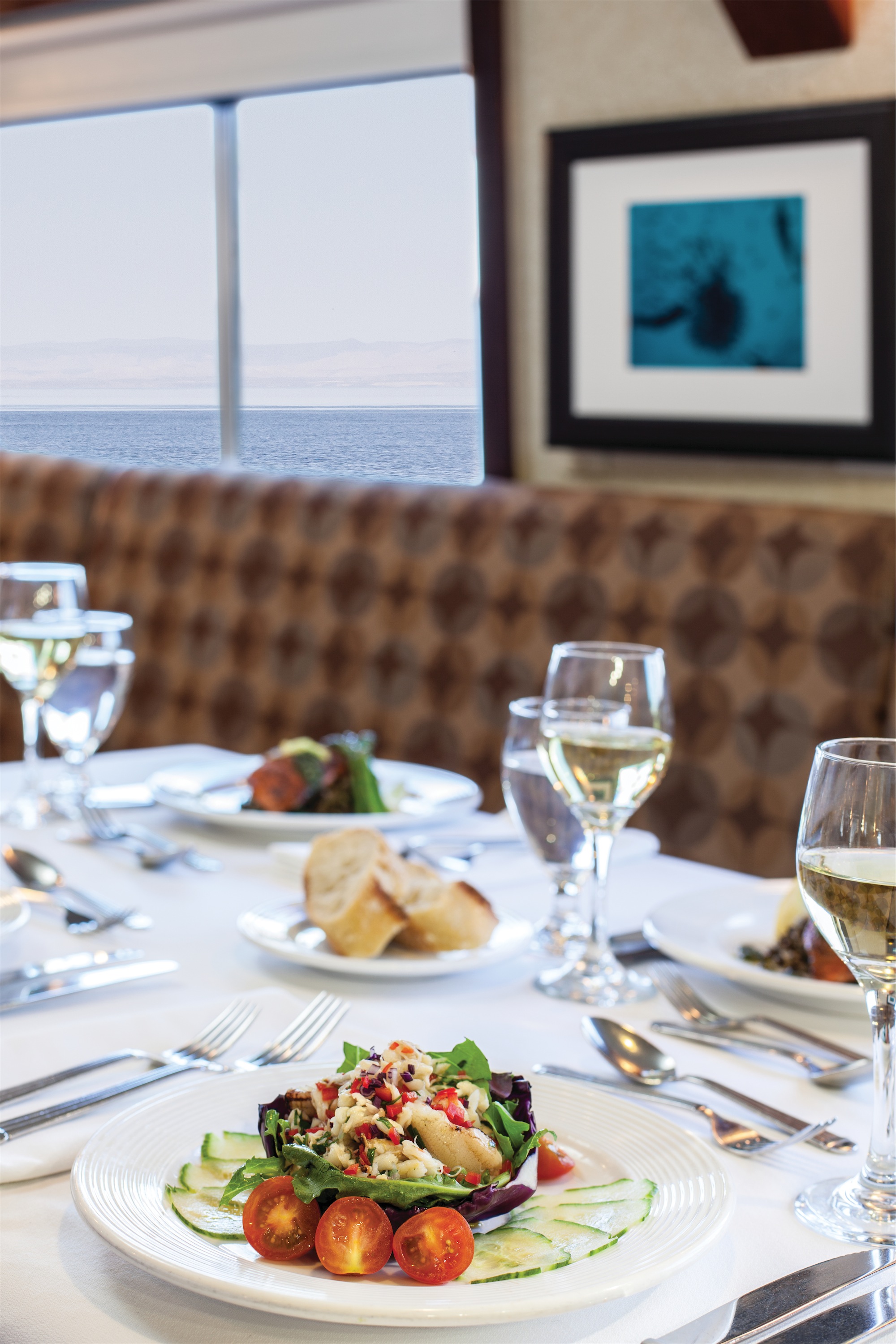 Lindblad Expeditions National Geographic Sea Bird & National Geographic Sea Lion Interior Dining Room 2.jpg