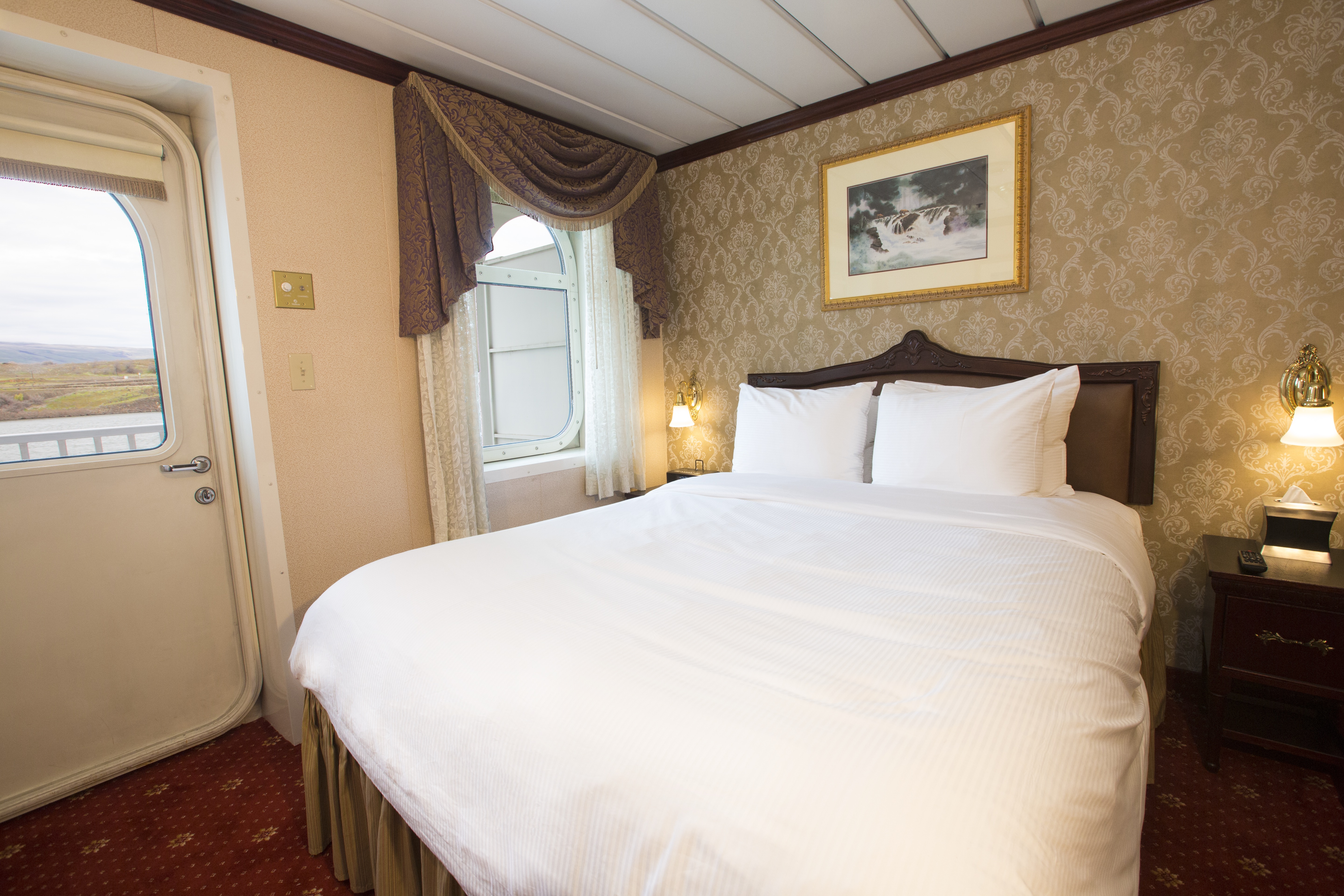 American Queen Steamboat Company American Empress Accommodation Deluxe Veranda Staterooms.jpg