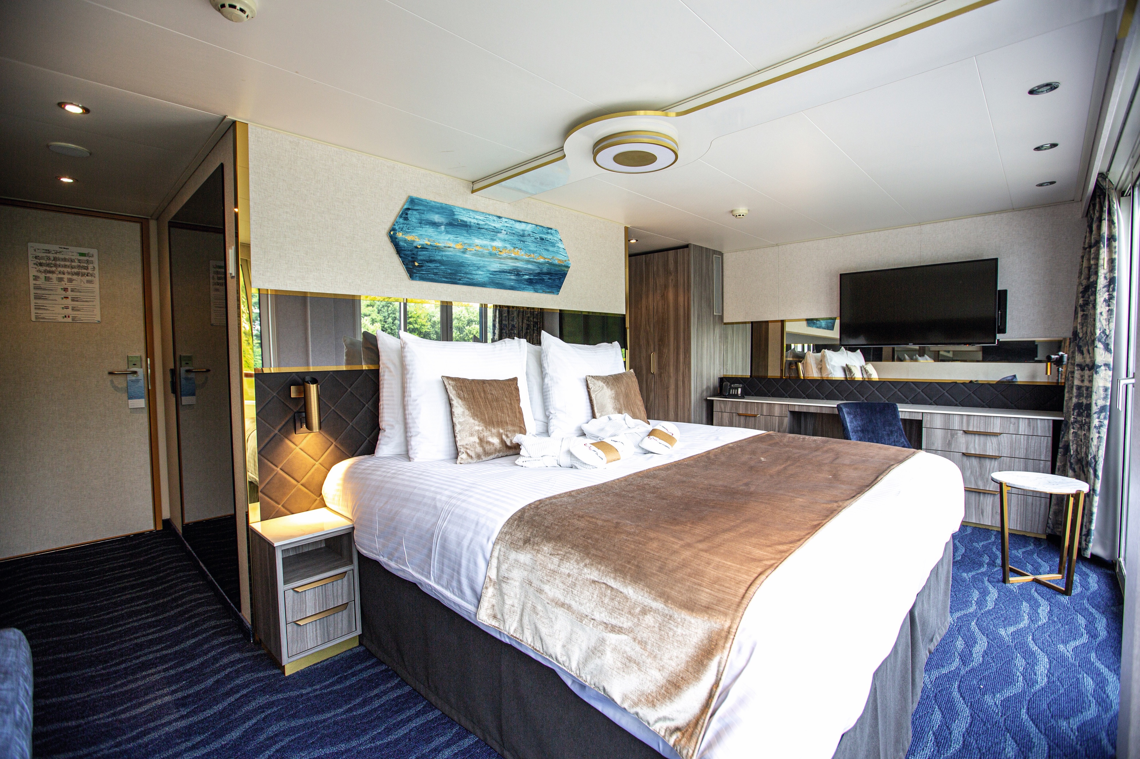 TUI Cruises TUI Isla Deck 2 French Balcony Suite Cabin 1.jpg